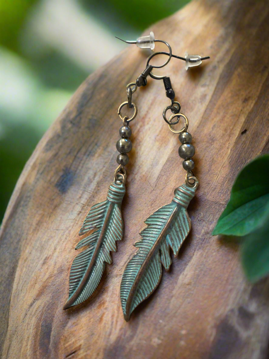 Feather dangle earrings