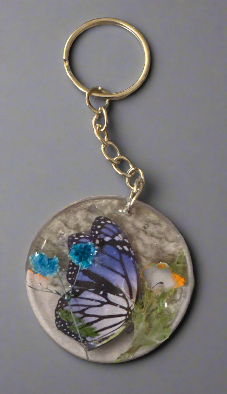 Butterfly and flower keychain round