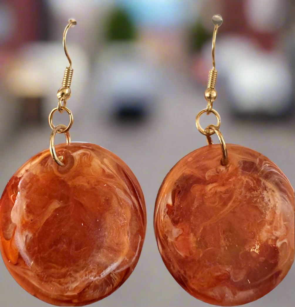 Orange resin round earrings