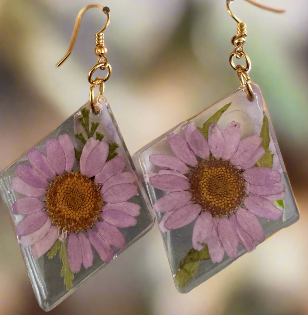 Purple flowers in clear resin - gold fish hook backings