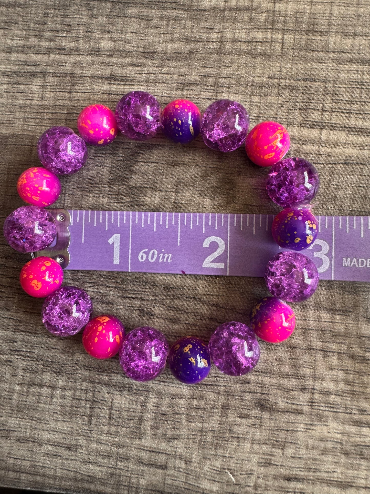 Purple and pink glass beaded bracelet