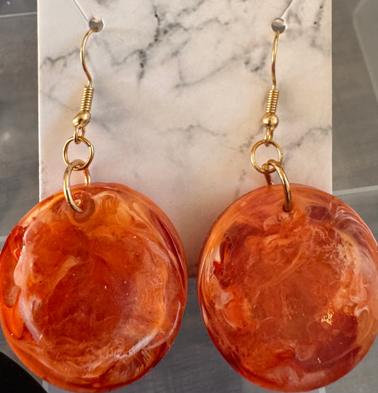 Orange resin round earrings