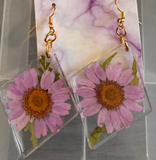 Purple flowers in clear resin - gold fish hook backings